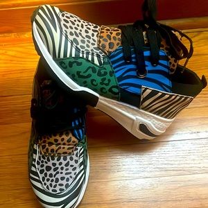 These shoes are colorful with stripes on them animal print, size 8 only wore one